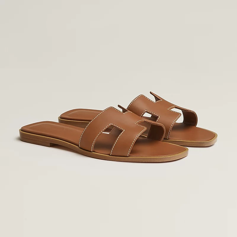 Hermès Oran sandals  "gold calfskin" leather.