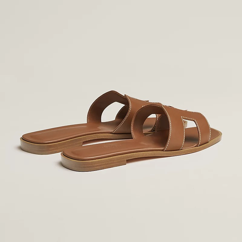 Hermès Oran sandals  "gold calfskin" leather.